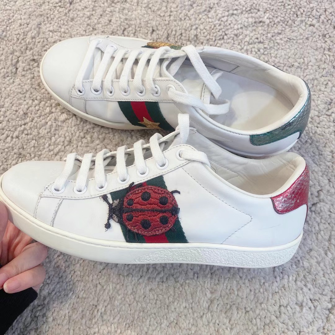 Used Gucci mismatched tail white shoes, size 3563440398051075111