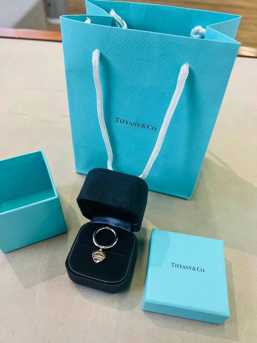 Tiffany & Co. Return to Tiffany series sterling silver + rose gold ring, Size: 4.563440333628546111
