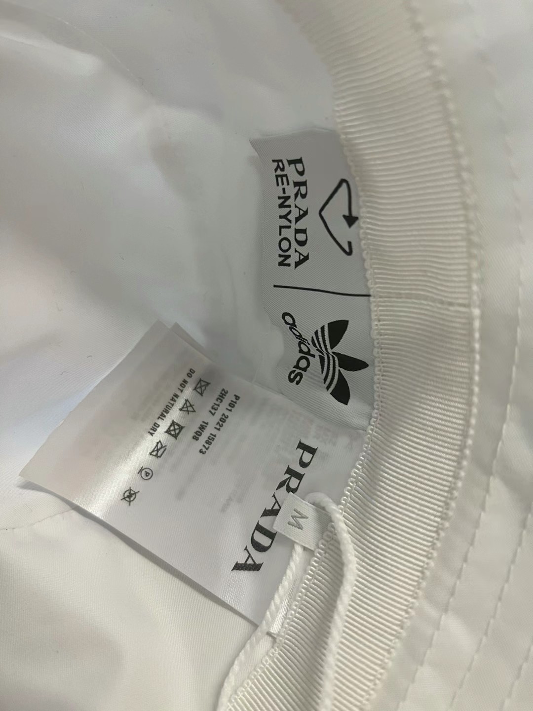 Prada collaboration bucket hat size S63440238615939112