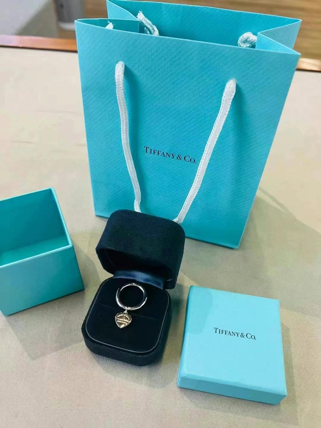 Tiffany & Co. Return to Tiffany series sterling silver + rose gold ring, Size: 4.563440196255617111
