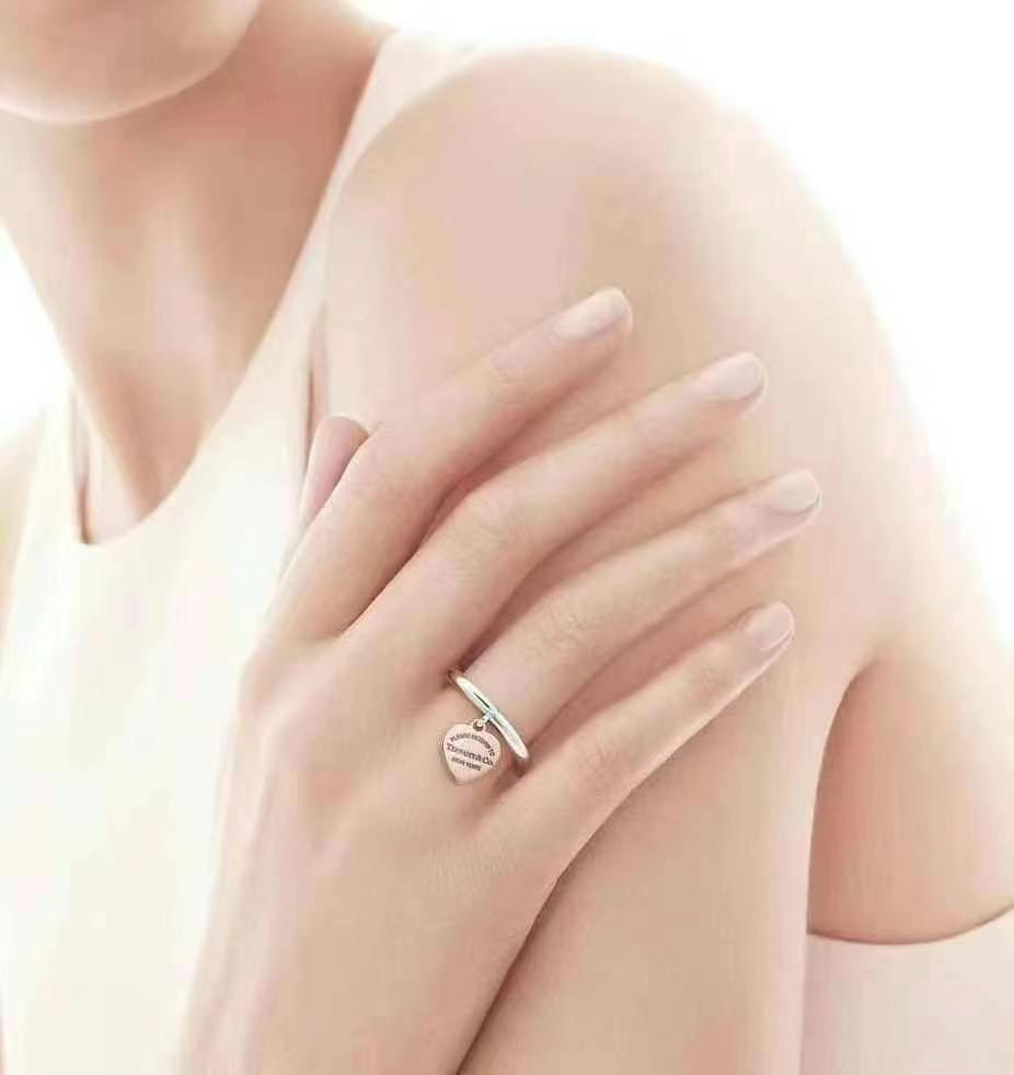 Tiffany & Co. Return to Tiffany series sterling silver + rose gold ring, Size: 4.563440196255617113