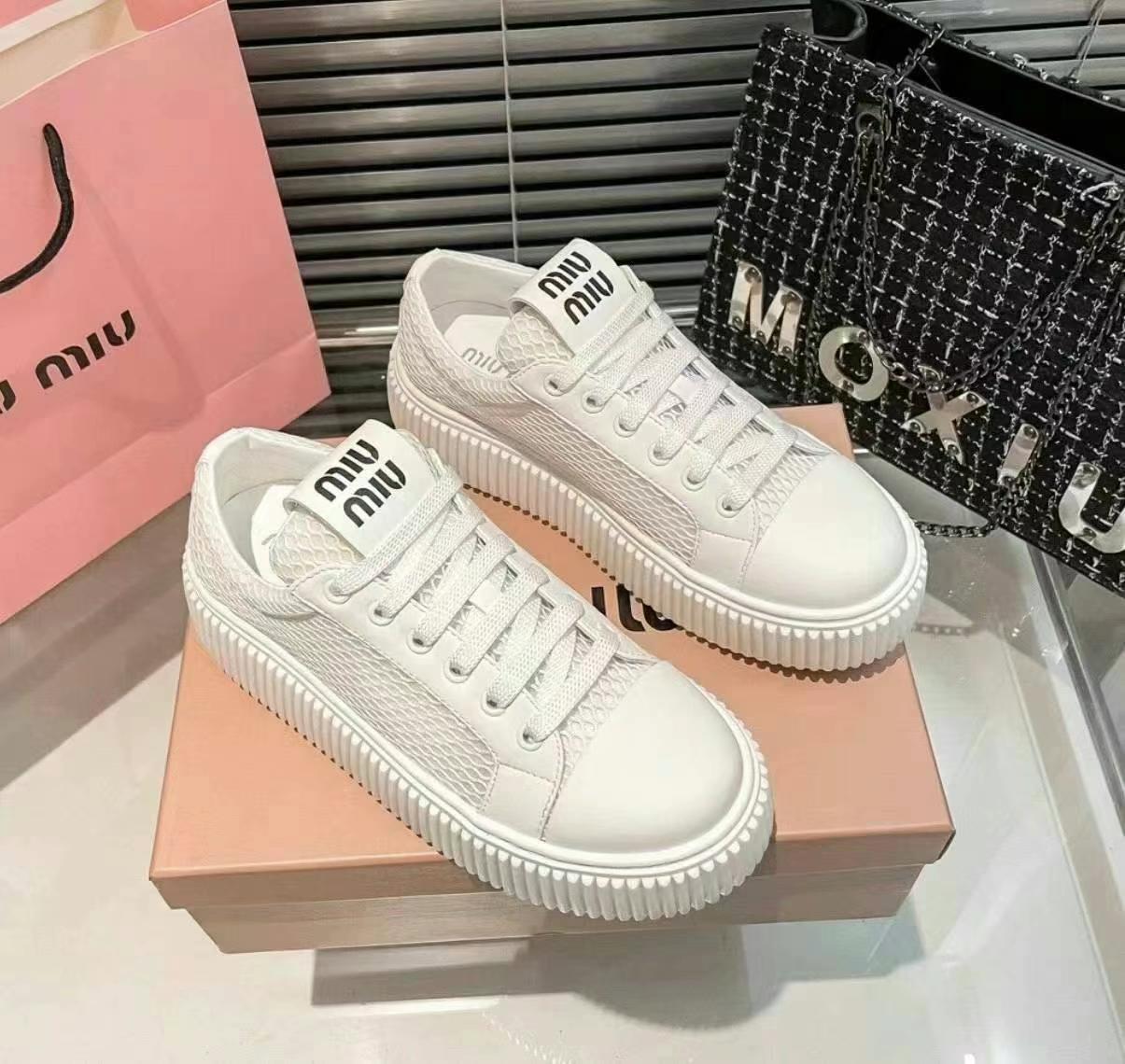 MiuMiu platform white sneakers  
Size: 35.5 36 36.563440143846145113