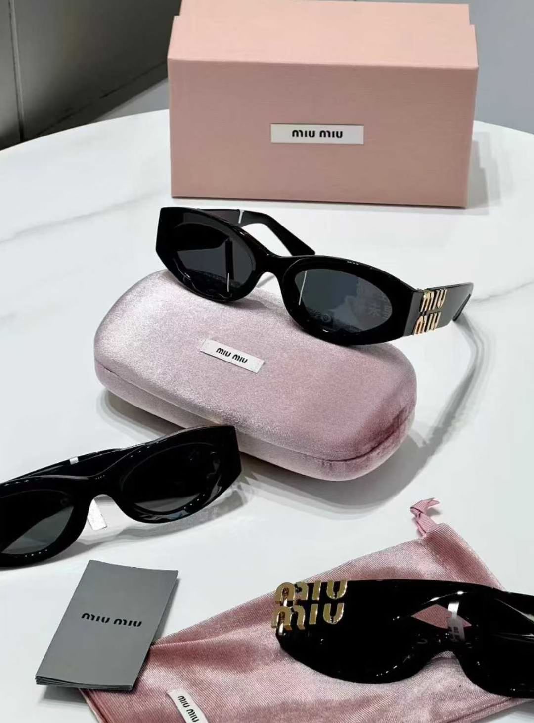 MiuMiu 太阳镜63439904962691110